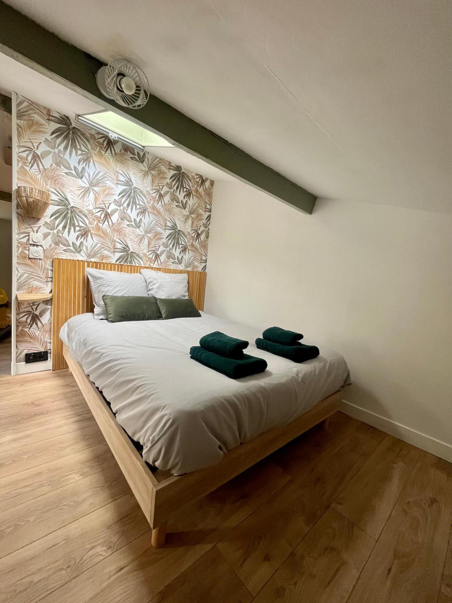 Sous Les Toits Du Parvis Apartment นีออร์ ภายนอก รูปภาพ